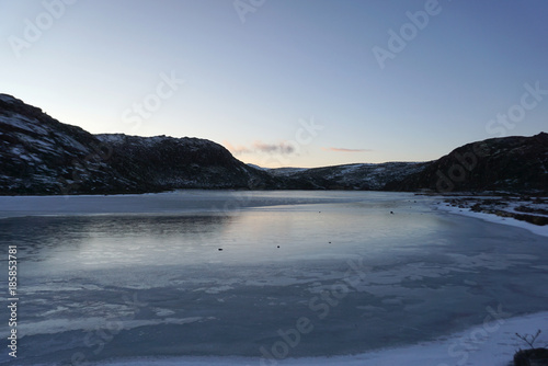 Beautiful landscape of the frozen lake with Tundra arctic in Teriberka