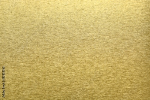 Texture of golden metal, abstract pattern background, selective focus