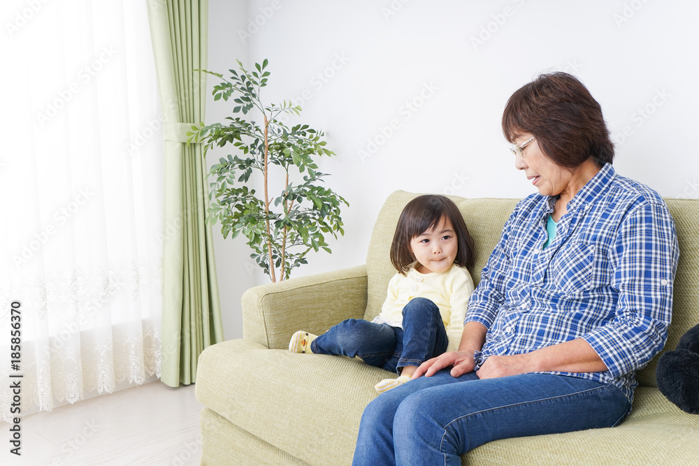 Child playing with grandmother