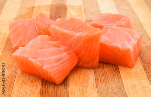 Raw Salmon Fillet on wood background