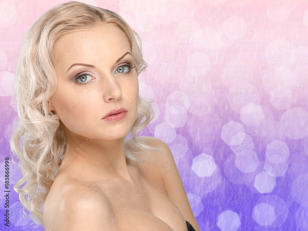 Naklejka premium Beautiful woman close up portrait on blurred background