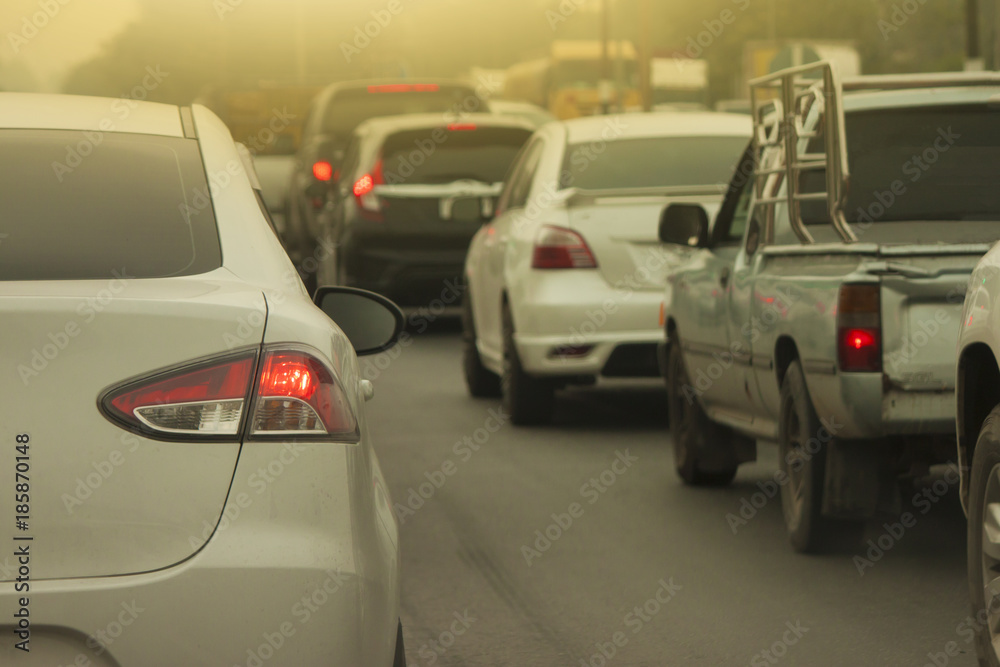 Cars on the road heading towards the goal of the trip.and stop on highway by traffic jam in city. Cars on the road heading towards the goal of the trip.and stop on highway by traffic jam in city.