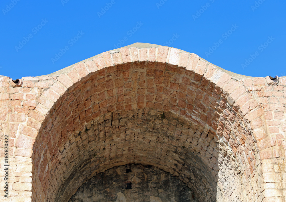 Detail of an ancient Arcade in bricks