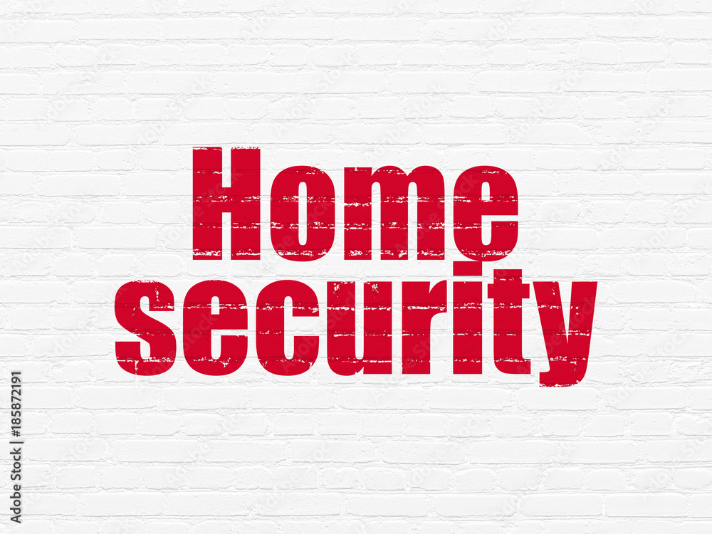 Security concept: Painted red text Home Security on White Brick wall background Security concept: Painted red text Home Security on White Brick wall background