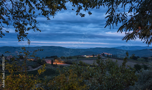 Fototapeta Naklejka Na Ścianę i Meble -  Panoramic view of scenic Tuscany landscape with rolling hills and valleys in beautiful moonlight at dawn