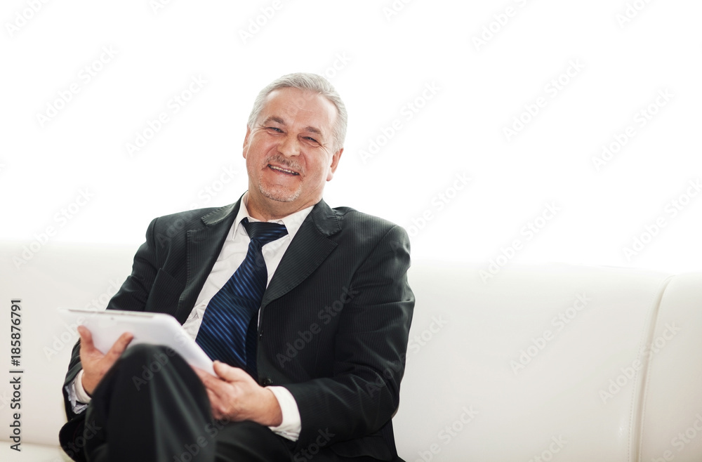 Portrait of a mature businessman with digital tablet Portrait of a mature businessman with digital tablet