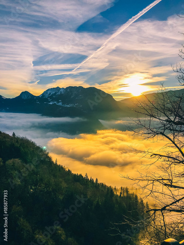Sun above the clouds in the mountains