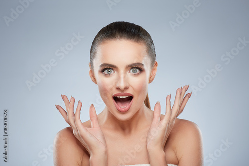 Beauty portrait of surprised woman