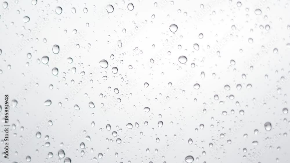 窓を流れる雨粒 窓を流れる雨粒