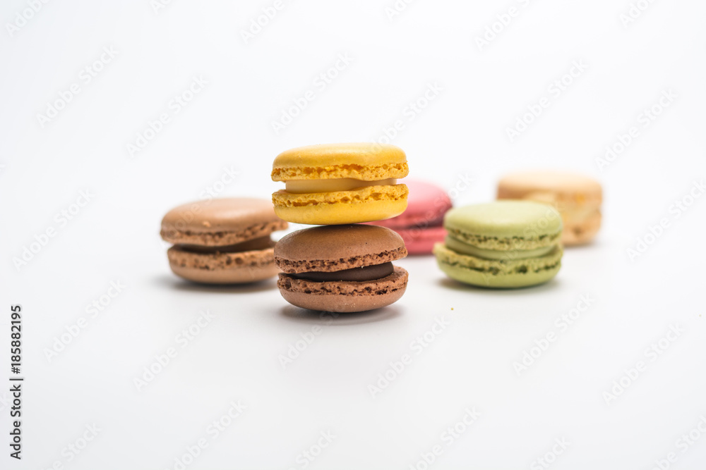 several small macarons of different flavors several small macarons of different flavors