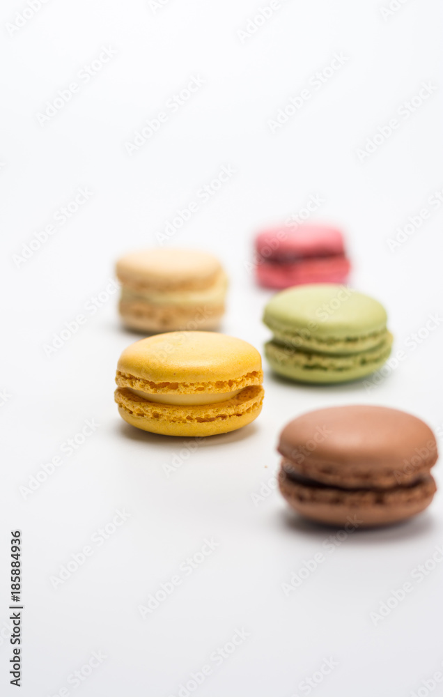 several small macarons of different flavors several small macarons of different flavors