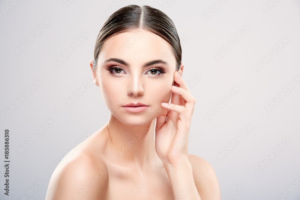 Beautiful girl with nude make up at studio Beautiful girl with nude make up at studio