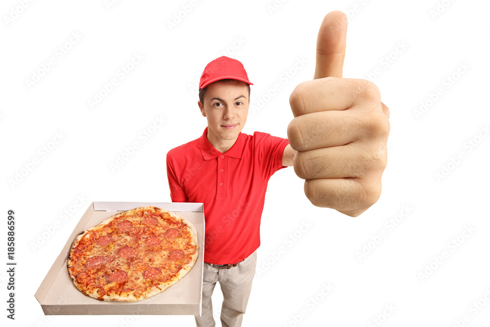 Teenage pizza delivery boy holding a pizza and making a thumb up gesture Stock Photo Adobe Stock