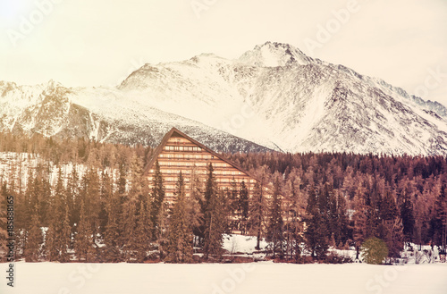 Peak and hotel Patria in Strbske pleso, yellow filter photo