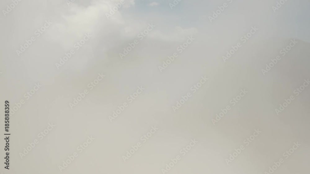 Aerial view of under the clouds, to the mountains and the lake. Lake Buyan,caldera lake at Bali. Landscape, lake among mountains, sky, clouds. 4K video. Aerial footage. Aerial view of under the clouds, to the mountains and the lake. Lake Buyan,caldera lake at Bali. Landscape, lake among mountains, sky, clouds. 4K video. Aerial footage.