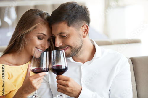 Couple In Love Drinking Wine In Restaurant. © puhhha