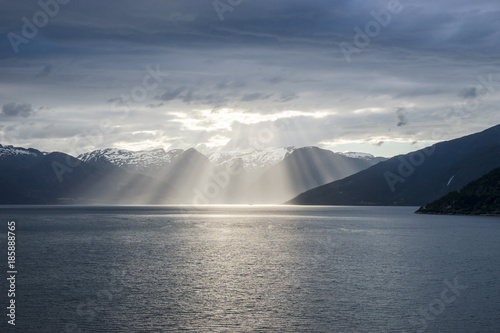 Bild auf Leinwand Sonnenuntergang am Fjord in Norwegen