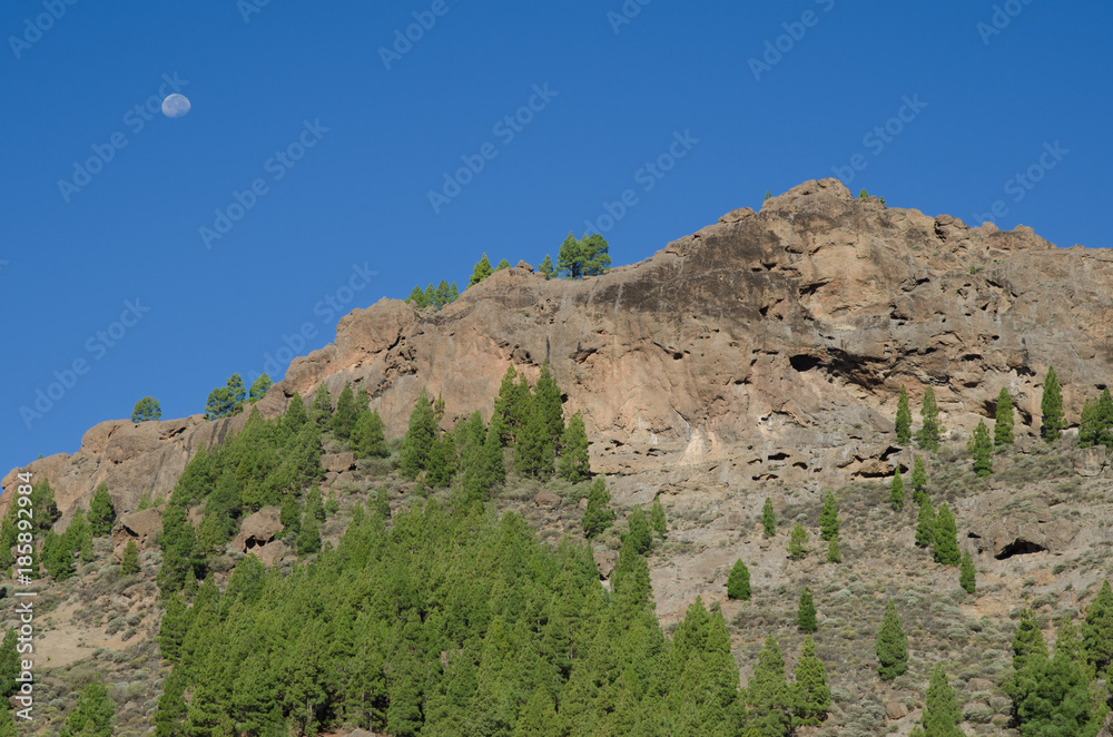Cliff and moon. The Nublo Natural Monument. Tejeda. Gran Canaria. Canary Islands. Spain. Cliff and moon. The Nublo Natural Monument. Tejeda. Gran Canaria. Canary Islands. Spain.