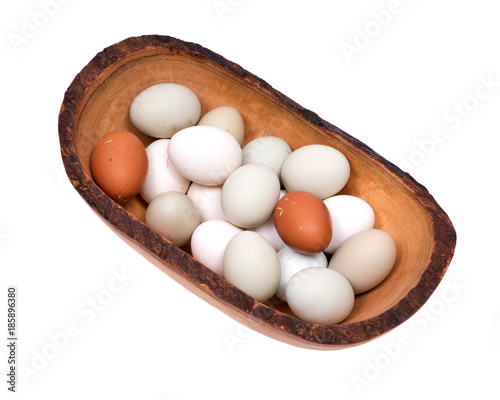 Wallpaper Mural Unwashed fresh organic gmo and soy free pasture raised chicken eggs in wooden bowl isolated on white background Torontodigital.ca