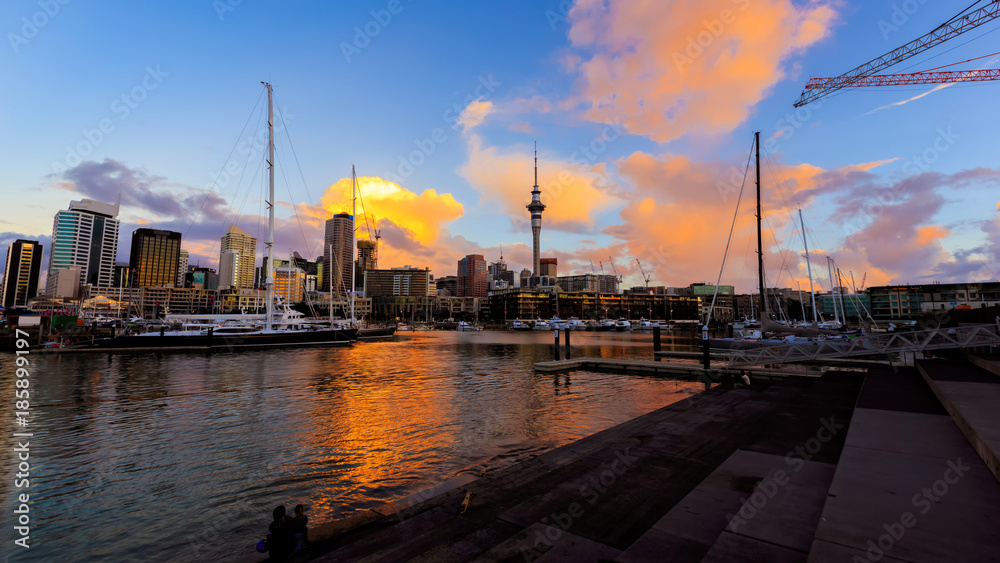 Panoramic of The landmark the Sky tower at Auckland with Harbor evening sky scene in NZ