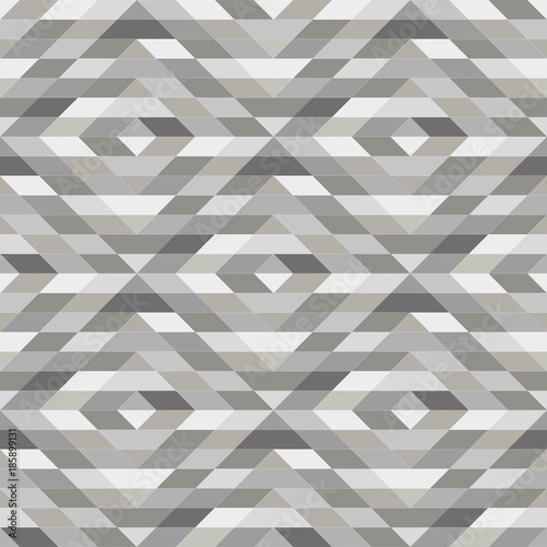 Abstract geometric patern with rhombuses. A seamless vector background. Grey texture. Graphic modern pattern