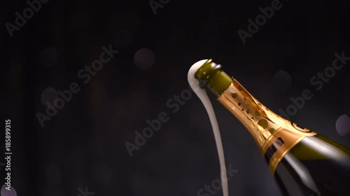 Champagne explosion. Sparkling wine popping, opening champagne bottle closeup. Slow motion. 4K UHD video footage. 3840X2160 photo
