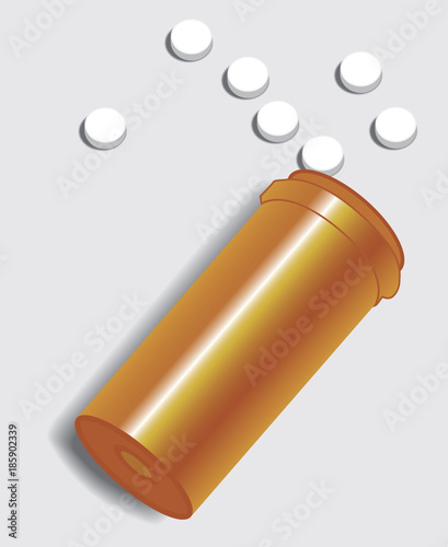 A bottle of prescription medication is lying on it's side with pills scattered above it