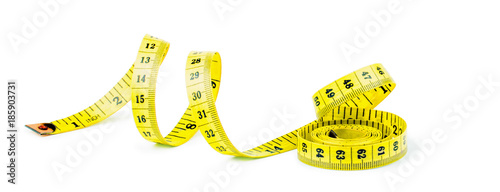 Yellow measuring tape isolated on white background