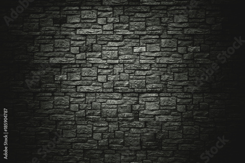 background, texture of a stone wall. dark background for design