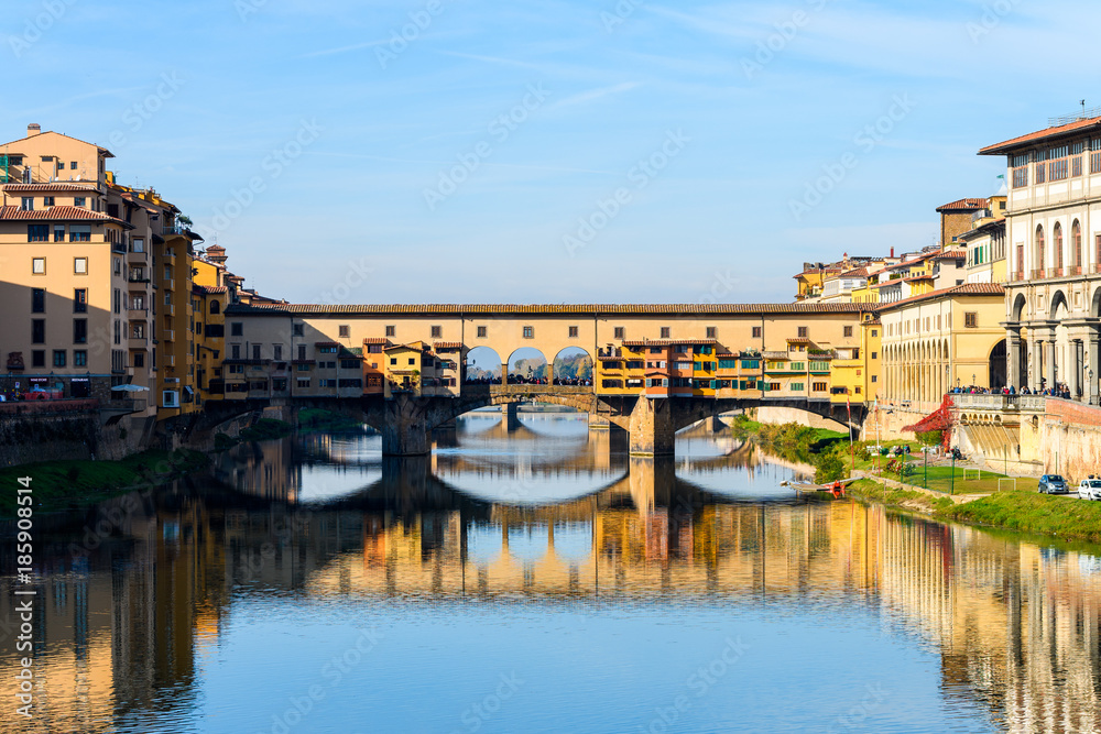 famous ponte vecchio bridge of florence on sunny day