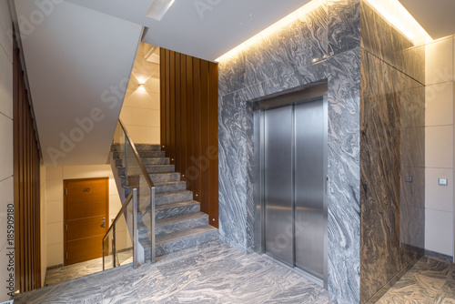 Hall staircase and elevator in a modern block of flats.