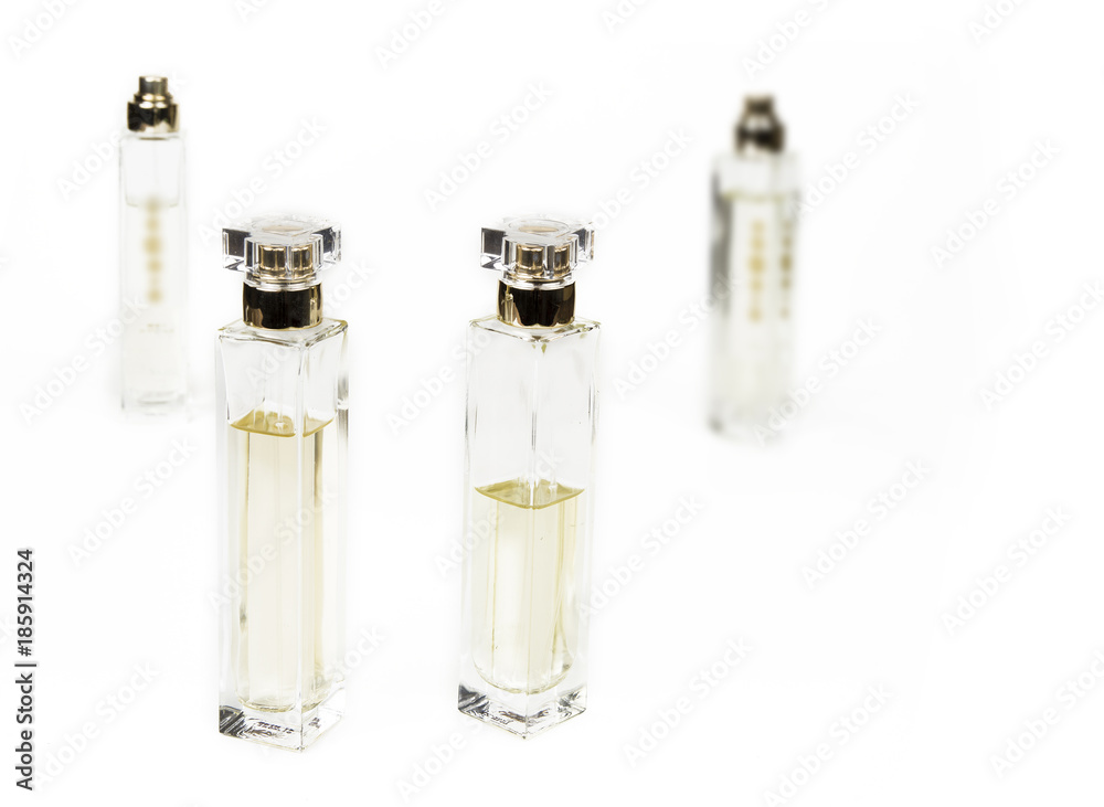 Used female parfumes on the white background