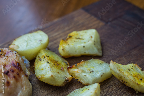 One Fresh Potato on Wood Table Background, Concept and Idea of Food Cook Rustic Still life Style.