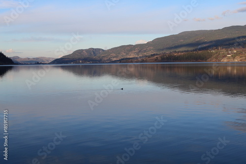 Calm lake and mountains landscape