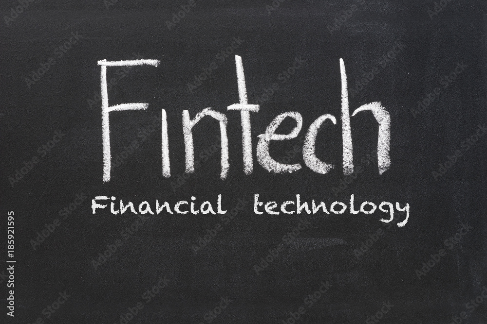 Fototapeta premium fintech word subject on black chalkboard