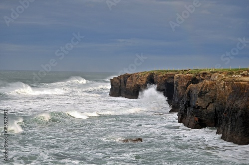 Beach Cliff with storm on Galicia Asturias, Spain