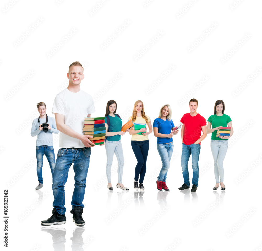 Fototapeta premium Large group of teenage students isolated on white background. Many different people standing together. School, education, college, university concept.