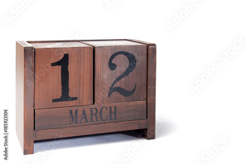 Wooden Perpetual Calendar set to March 12th