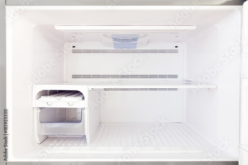 The empty freezer is a view inside.