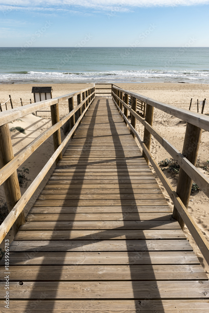 wooden bridge to access the beach
