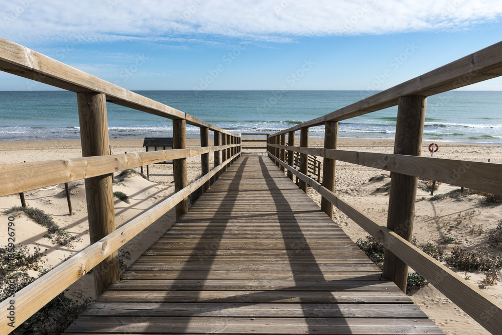 wooden bridge to access the beach