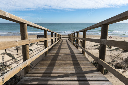 wooden bridge to access the beach © MariaTeresa