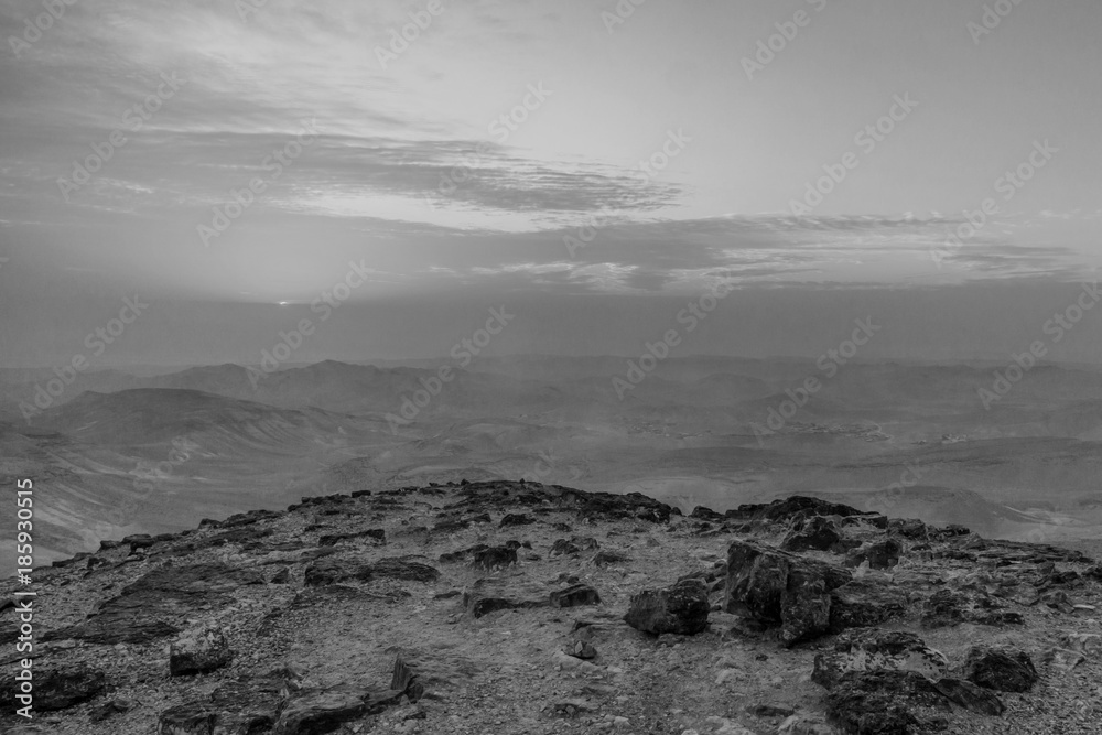 White and black magic landscape of judean desert in Israel. Outdoor sunlight and sunrise over holy land