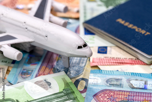 Preparing for a trip concept, an airplane money passport