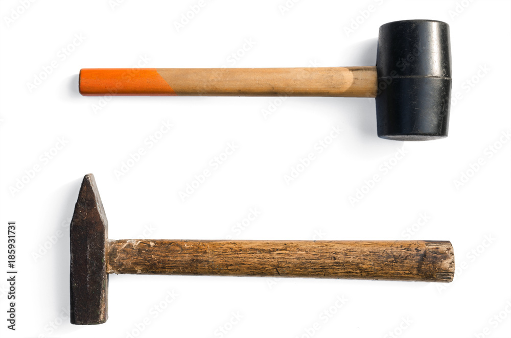 Rubber and steel hammers isolated on a white background. Rubber and steel hammers isolated on a white background.