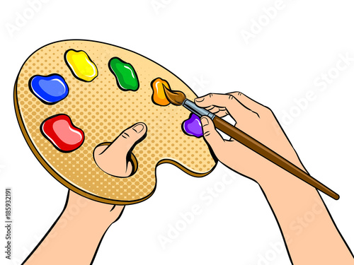 Palette with paints in artist hands pop art vector