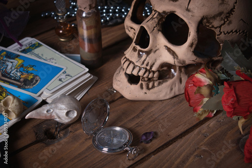 Mystic still life with skull  tarot cards  books and candles