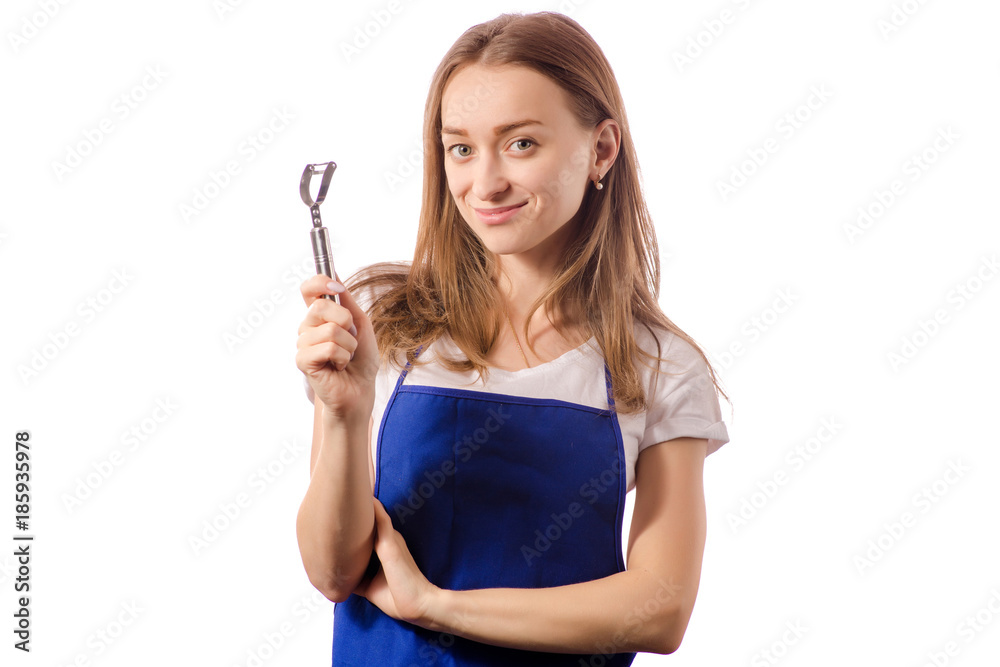 Young woman in apron holding kitchen knife for cleaning Young woman in apron holding kitchen knife for cleaning
