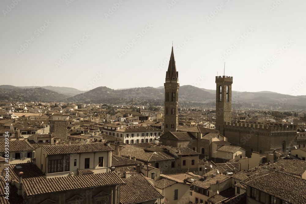 Roofs of Florence from Palazzo Vecchio in a sunny day, Tuscany, Italy. Aged photo effect.