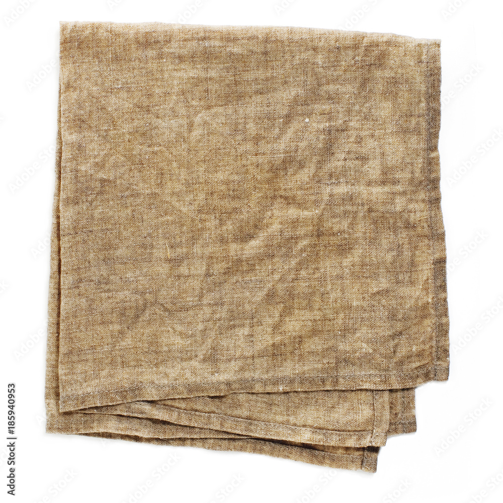 folded linen serviette on a white background folded linen serviette on a white background